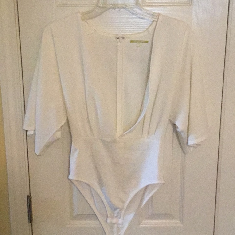Cream Colored Plunging Neckline Bodysuit